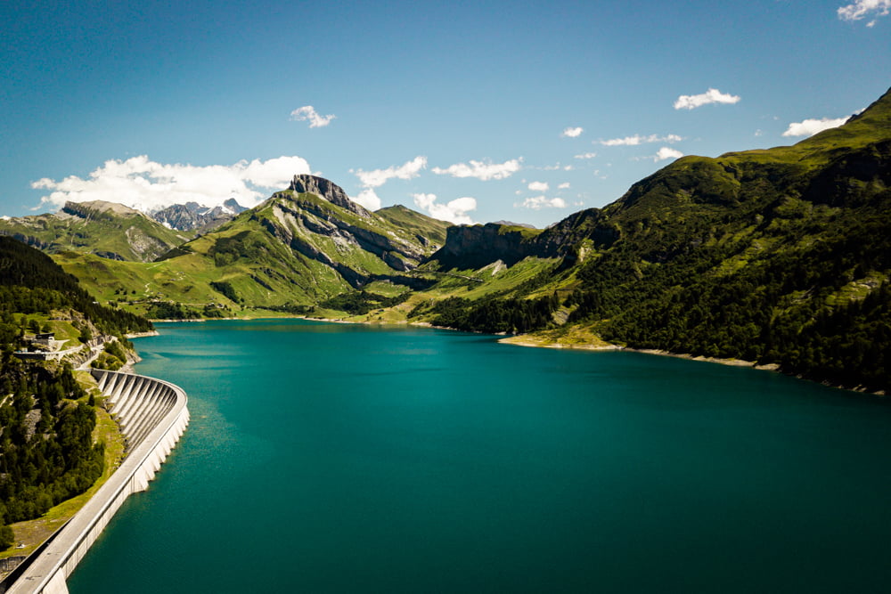Le Lac De Roselend Depuis Le Sommet Du Roc Du Vent Le Lac De Roselend Depuis Le Sommet Du Roc Du Vent